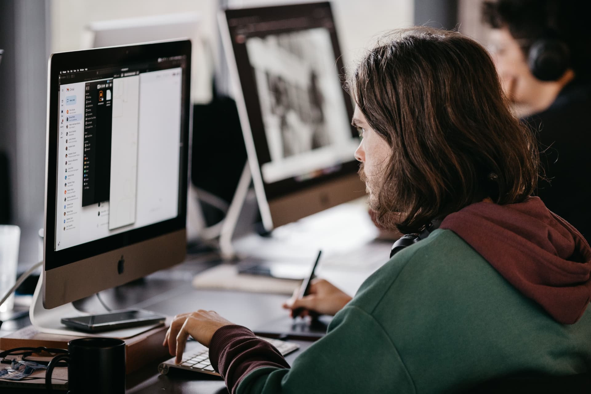 A developer working at a desktop computer